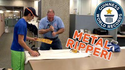 Strongman Tears Licence Plates