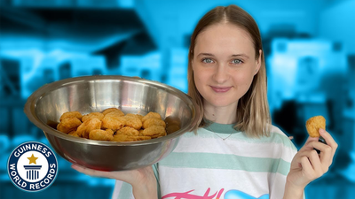 Most chicken nuggets eaten in one minute