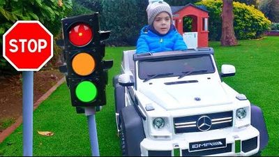 Alex Having Fun Driving with the Car*Power Wheels with Traffic Lights?